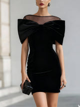 Elegant black velvet mini dress with bow